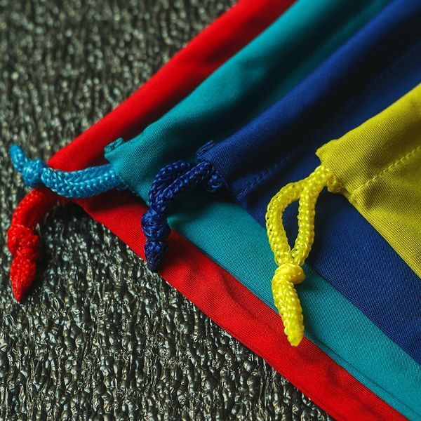 Комплект із 4-х мішечків 17х14 см до гри Пройдисвіти Кведлінбурга (4 кольори) YB-0001 фото