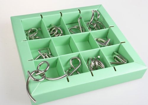 Зелений набір залізних головоломок (10 Metal Puzzle Green) 473357 фото